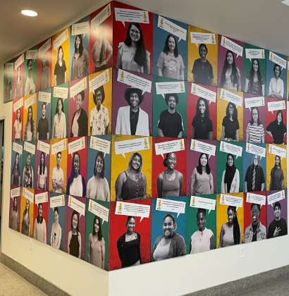 Posters of VCU first-gen students posted on walls inside of Cabell Library.